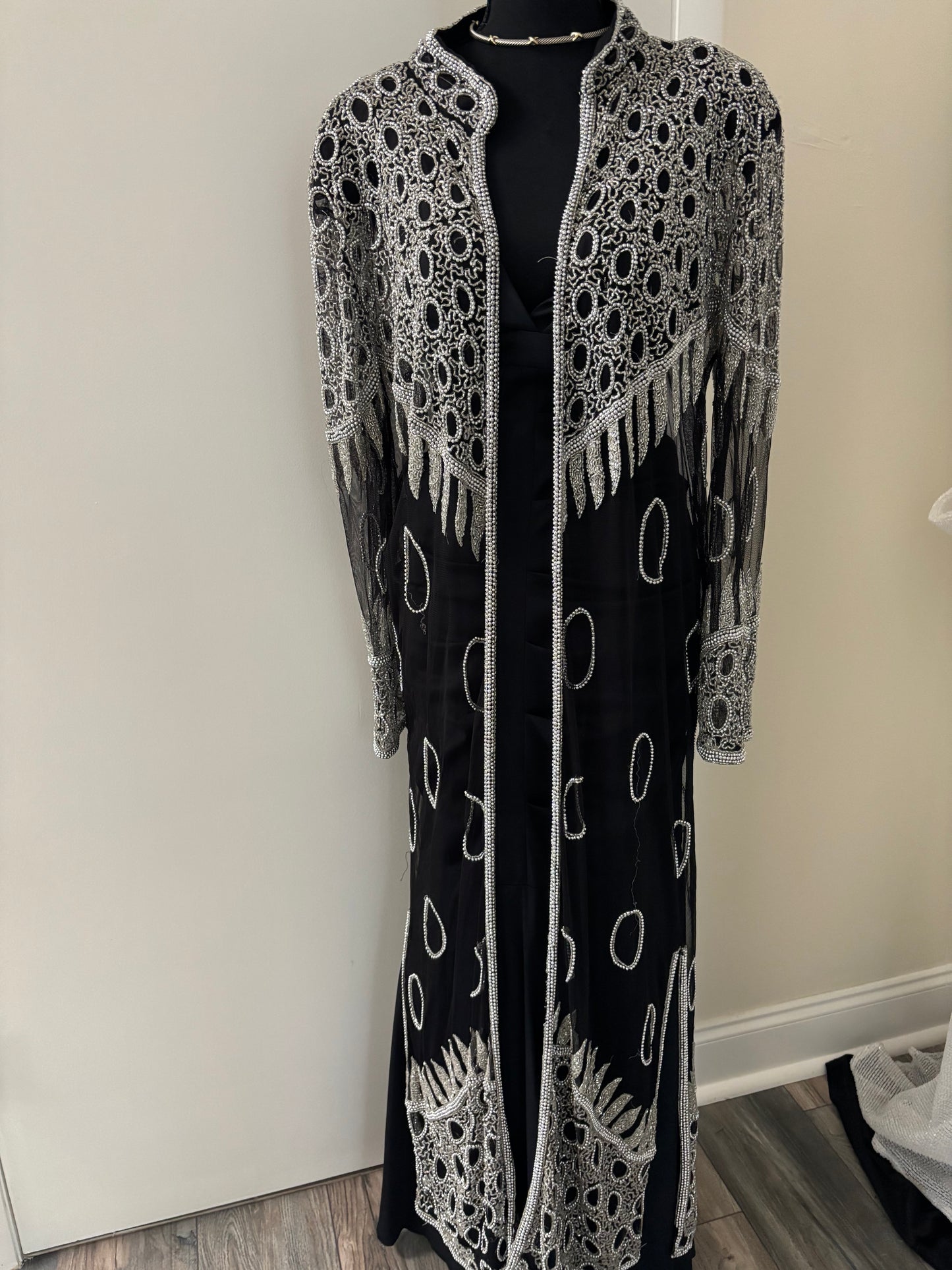 Floor length black sheer Georgette coat with silver embroderies
